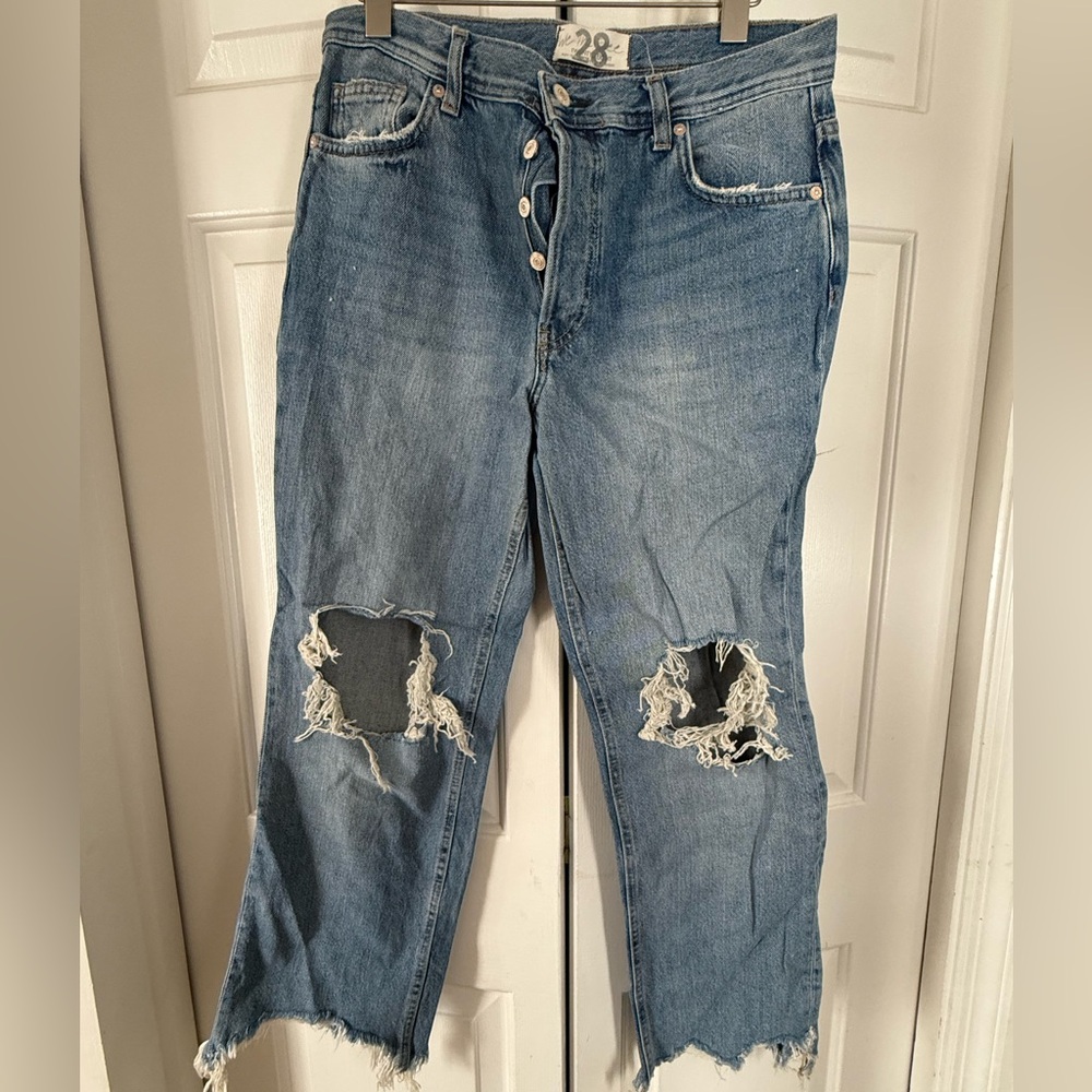 Free People button up distressed cropped denim jeans.